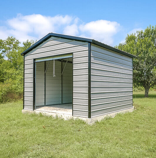 Small garage on a grass field