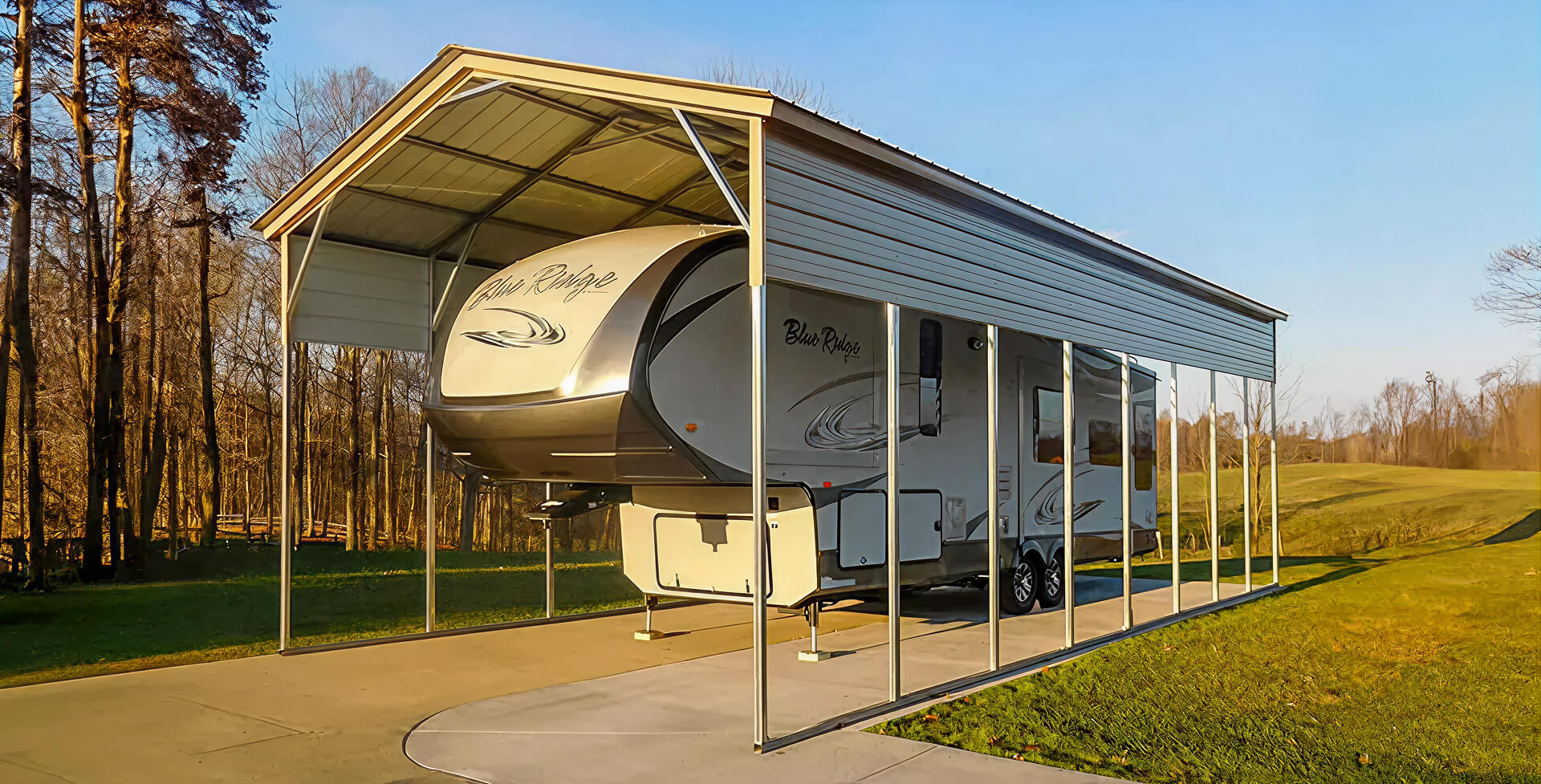 Metal carport sheltering RV trailer on concrete pad