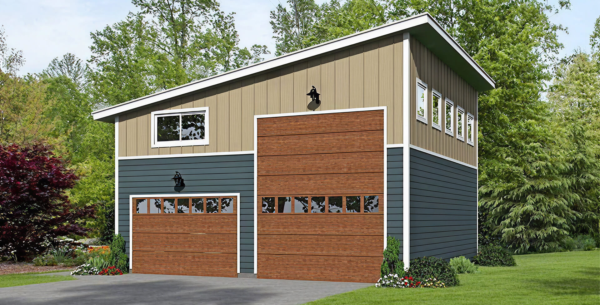 Two-story garage with mixed siding and wood-tone doors