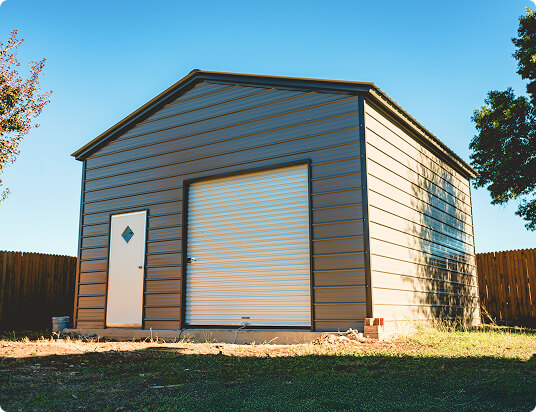 Metal garage with walk-in door