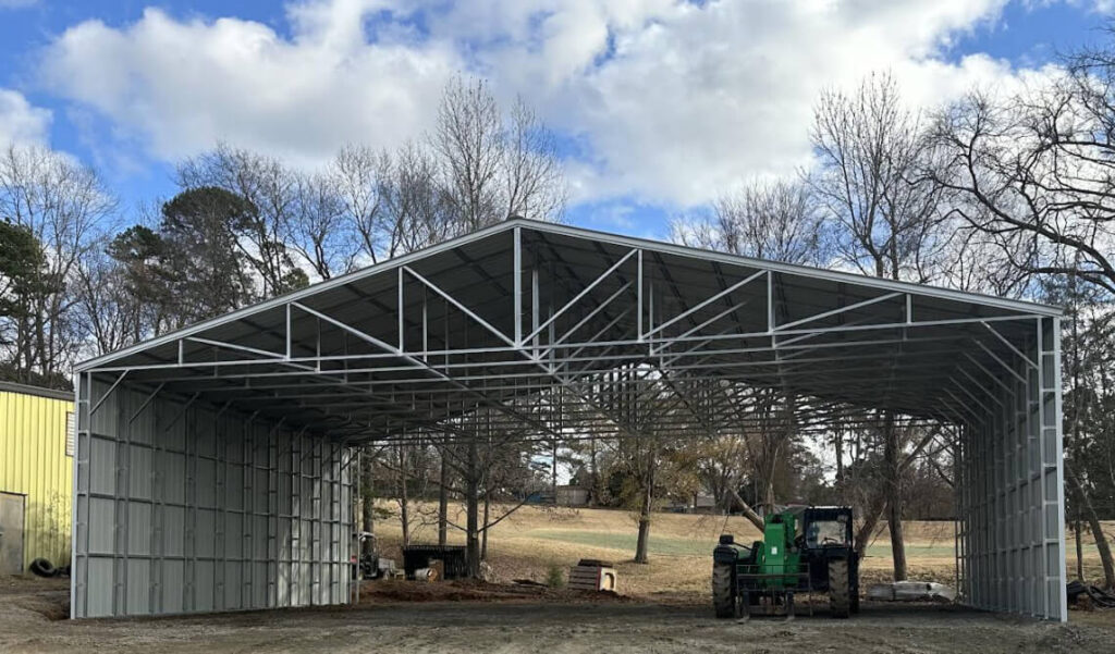 Vertical Carport 60x40x16 with Both Sides Closed - Vertical Siding - COMMERCIAL Pewter Gray Roof, White Trim, Sandstone Sides 3