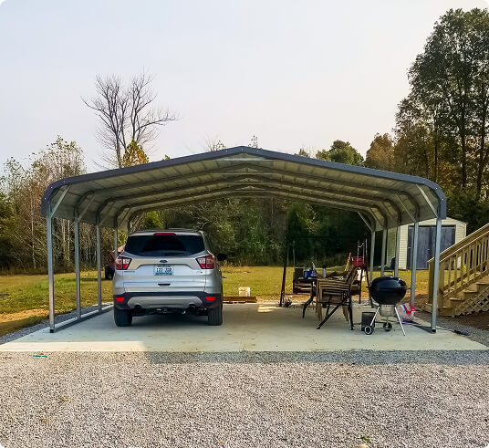 Car under metal carport