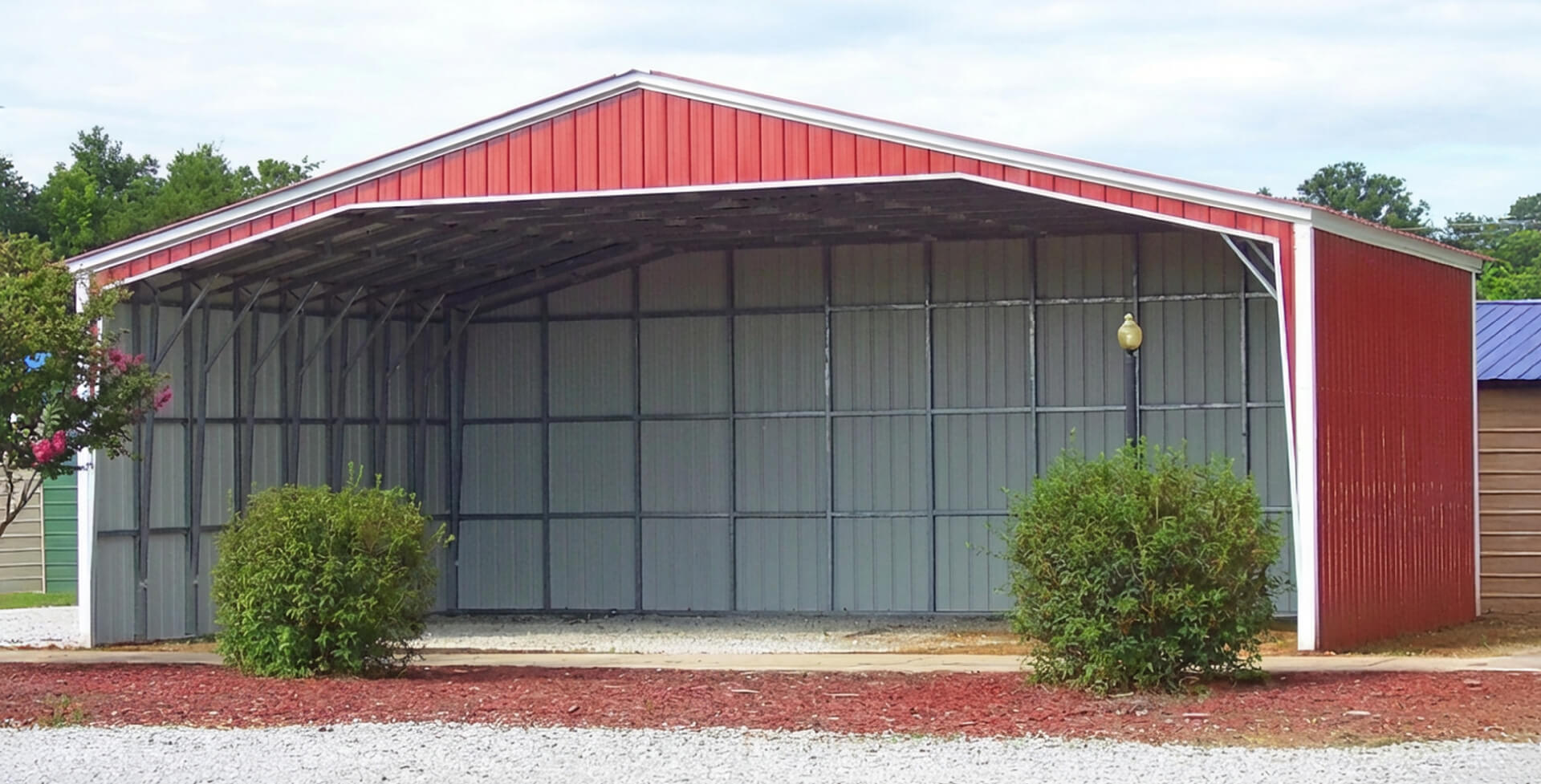 Open-front 50×60 metal building configuration designed for carport use, farm equipment storage, or airflow-focused access.