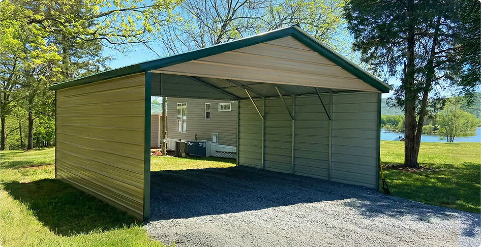 This enclosed Carolina-style metal structure shows how a carport can be upgraded into a fully enclosed garage using Alan’s customization options.