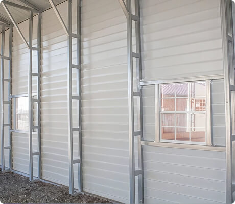 Steel building interior with optional metal lap siding which runs side to side
