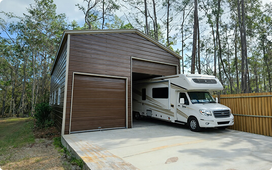 RV parked in a metal garage